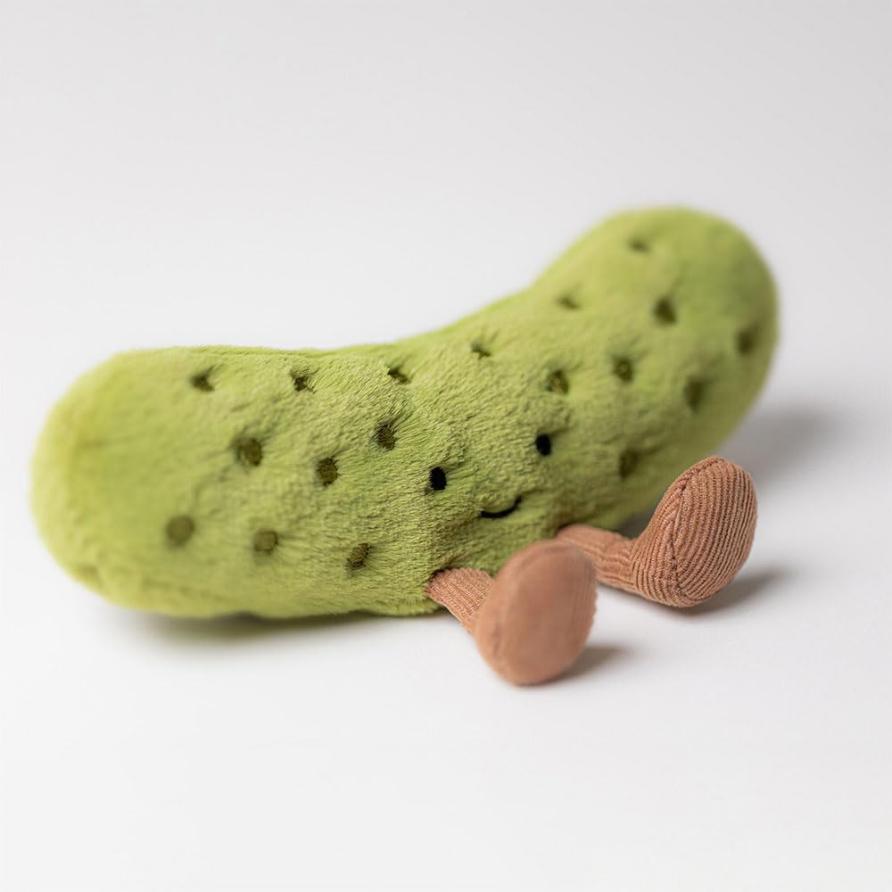 Jellycat pickle playtime with child illustrating safe cuddling companion