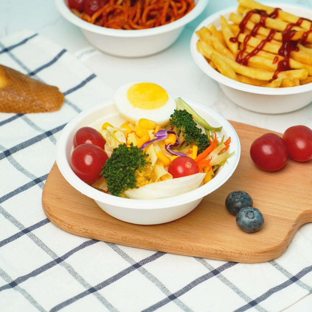 JINVOGREEN bowls in a commercial compost bin illustrating industrial compostability