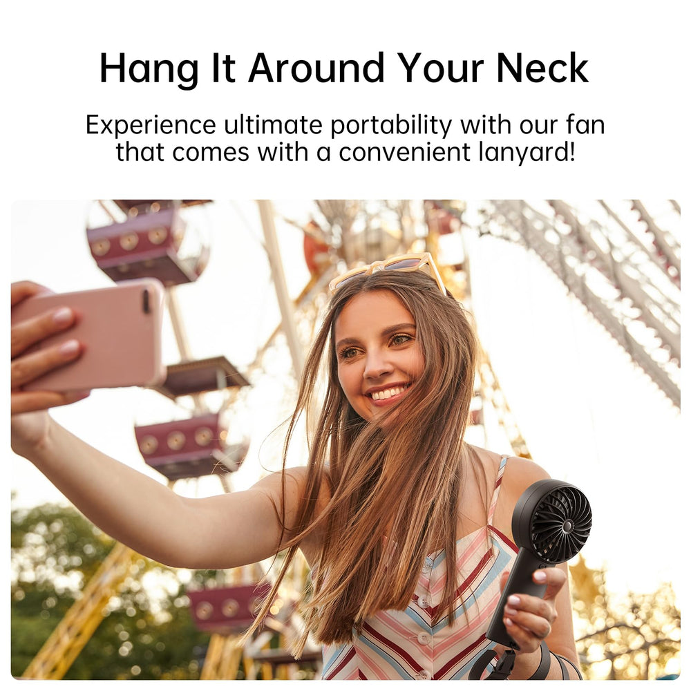 JISULIFE held in hand to show size and comfortable, travel-friendly design