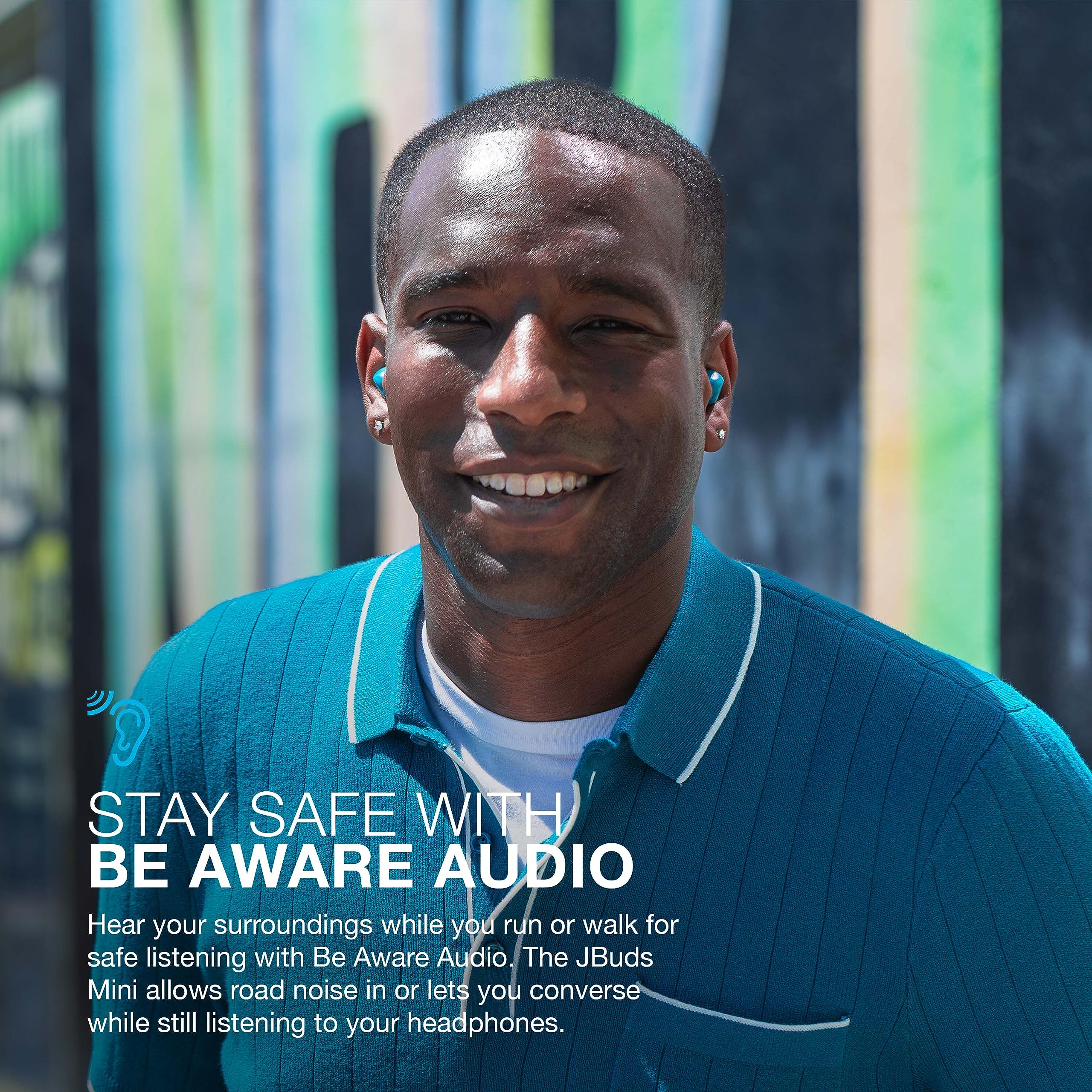 JLab JBuds Mini touch controls and logo visible for quick playback and call handling