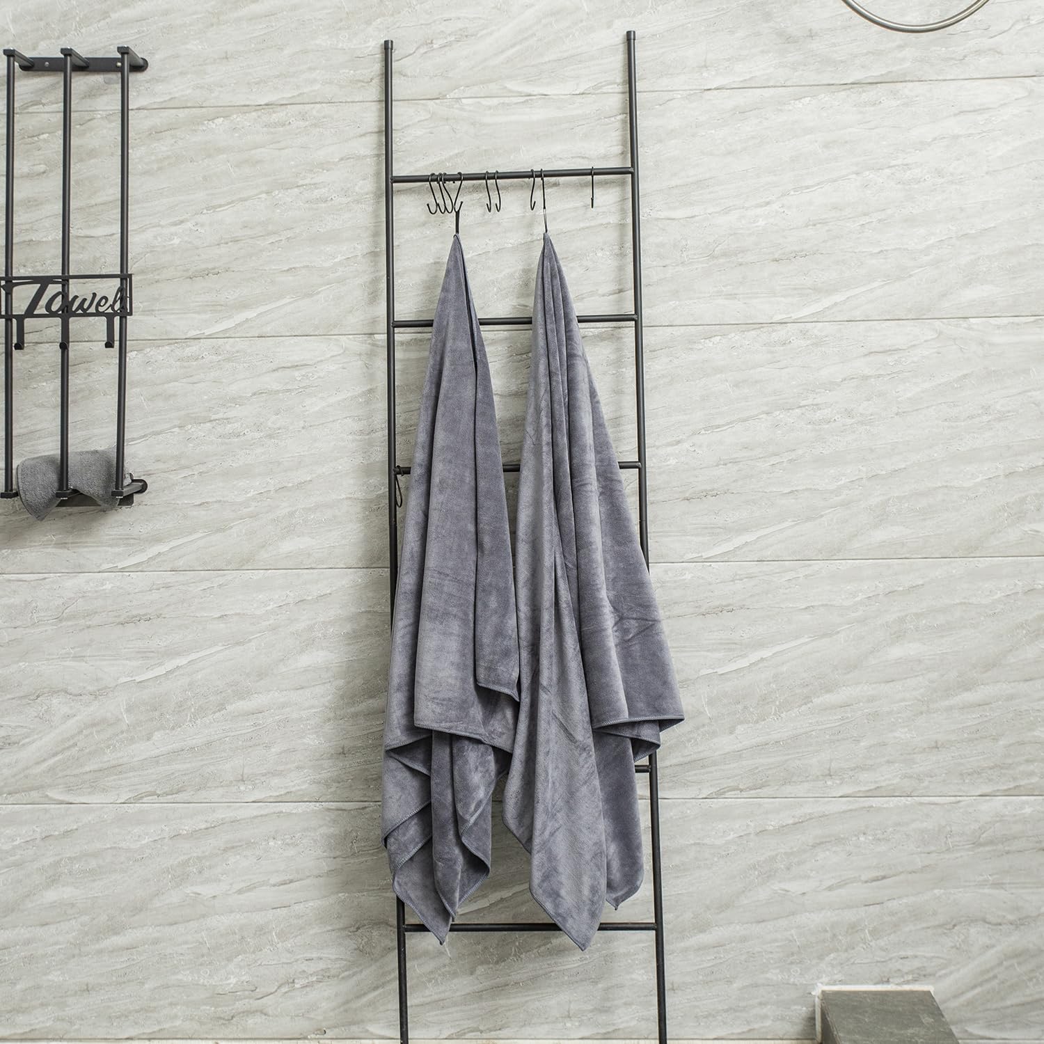 JML towel draped over gym equipment showing compact gym-ready convenience
