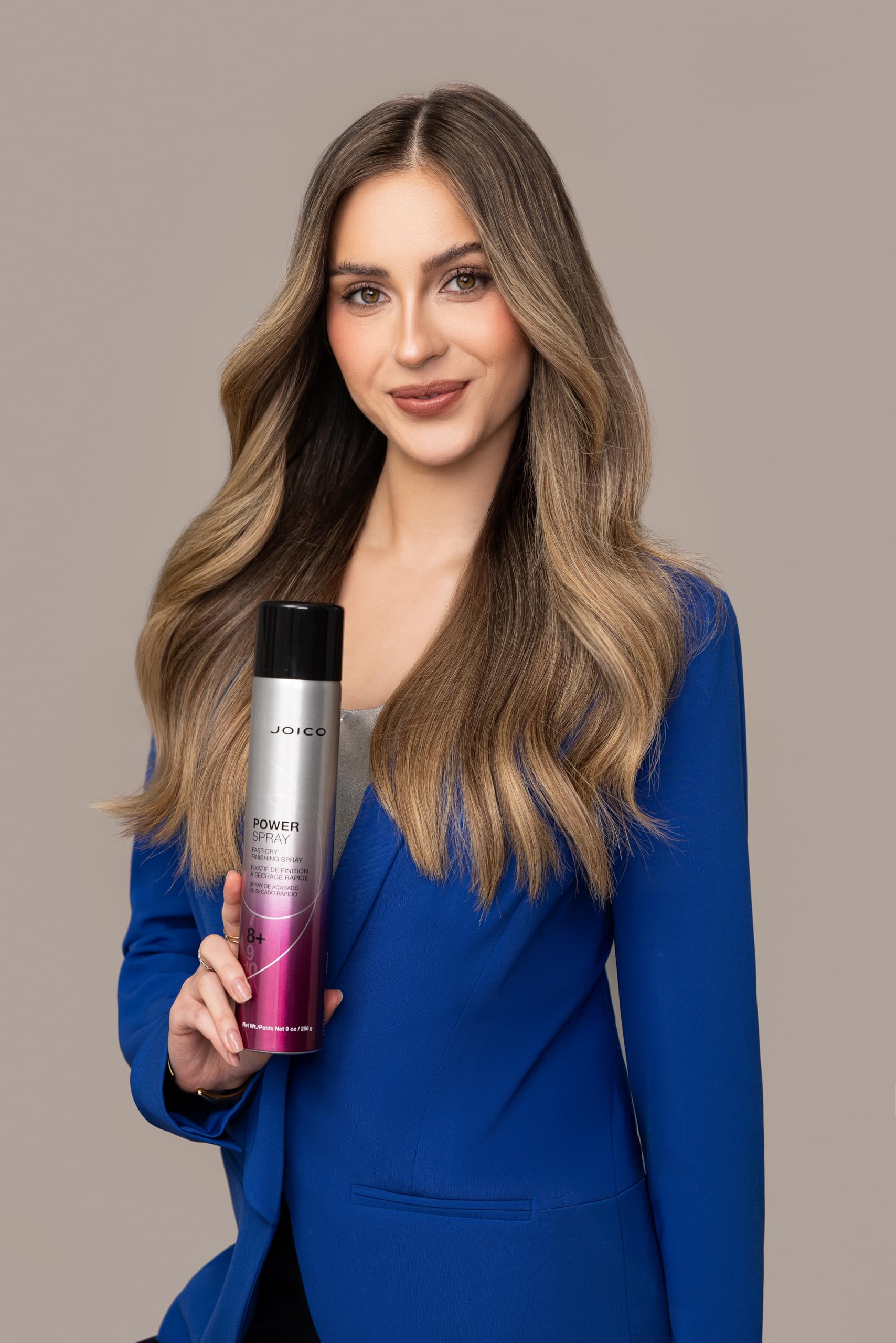 Joico styling in use on a blowout showing long-lasting hold benefit