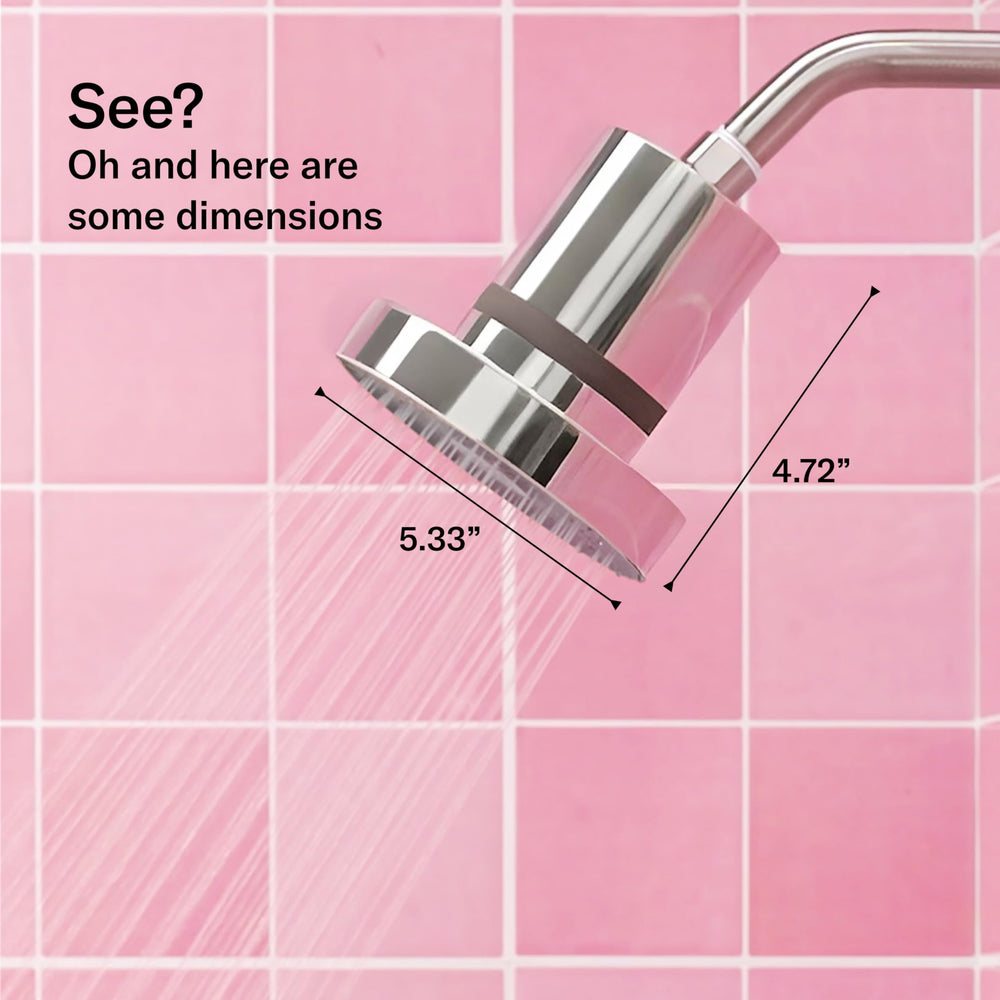 Jolie size and scale comparison with hand demonstrating fit on shower arm