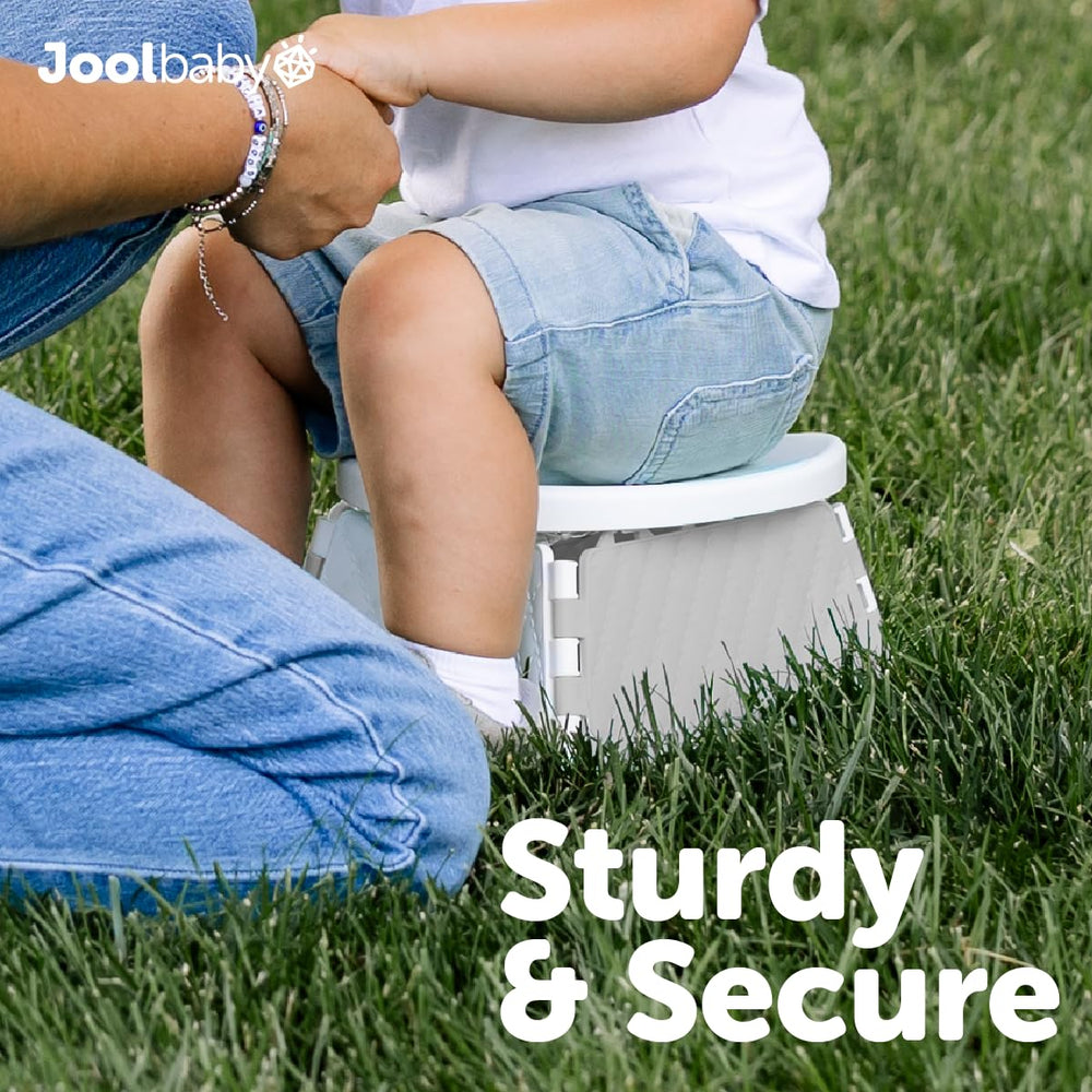 Jool Baby in use by a toddler at a park for portable outdoor toileting ease