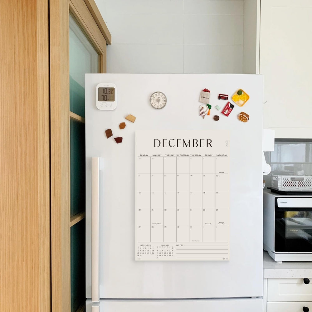 Jotsome on fridge with notes demonstrating visible family reminders and coordination