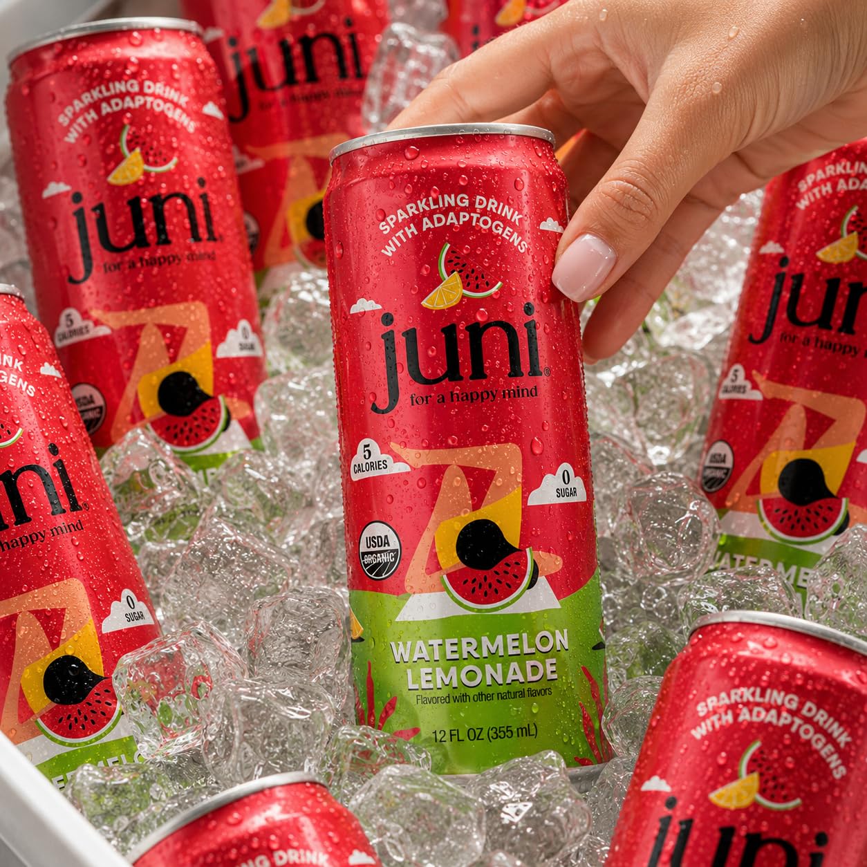 JUNI poured in glass with ice shows clarity and crisp citrus refreshment