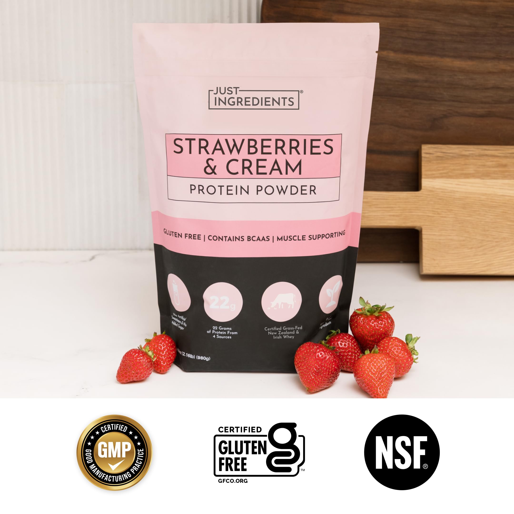 JUST INGREDIENTS blended shake in glass showing creamy strawberry flavor and quick nutrition
