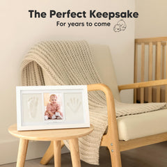 KeaBabies kit in use pressing a baby hand into clay for clear imprint