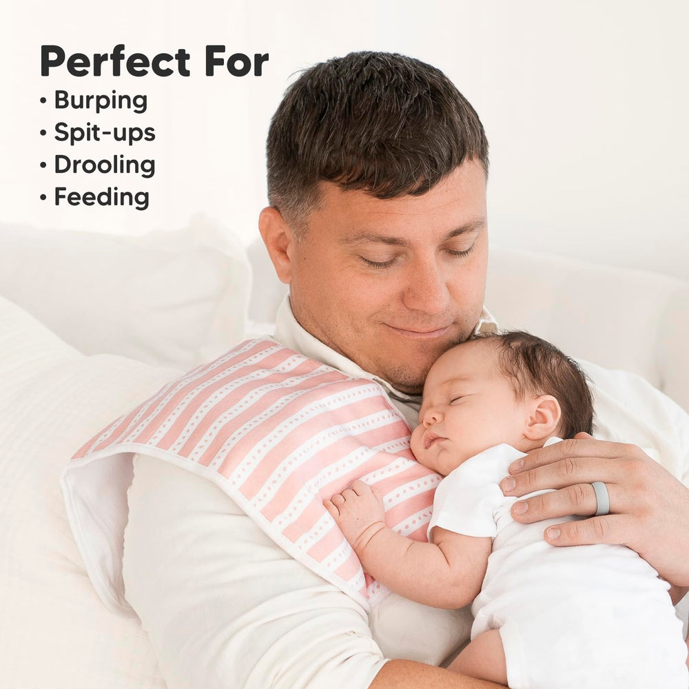 KeaBabies burp cloth held in hand to show size and portability benefit