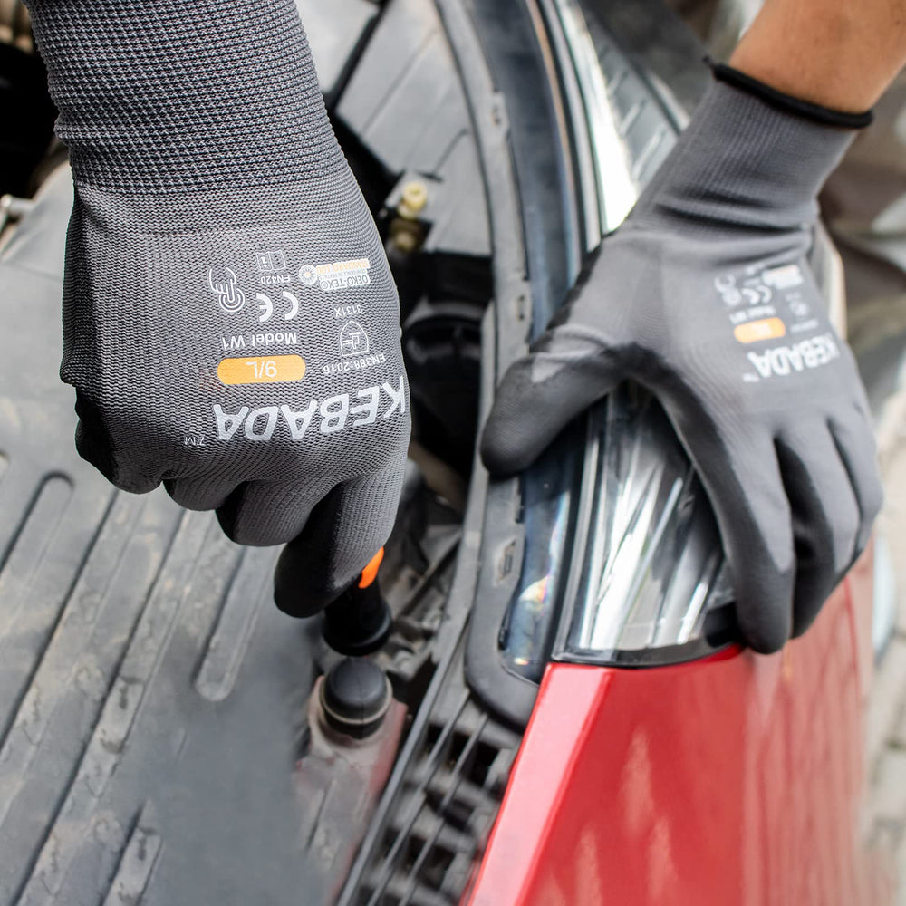 Kebada W1 worn during box handling illustrating firm grip and reduced slippage on parcels