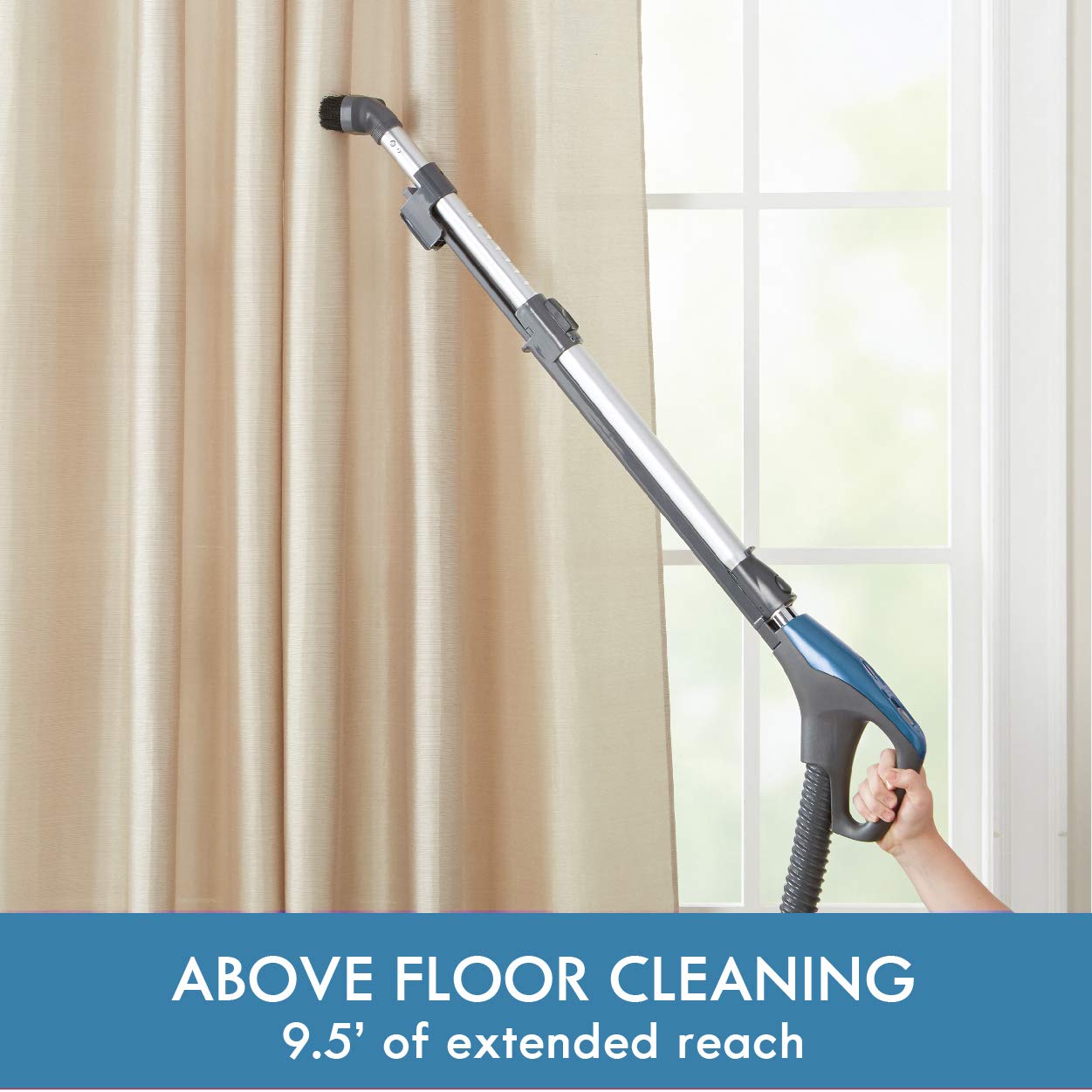 Kenmore vacuum with onboard storage displaying brush, crevice tool and bare floor tool for quick access