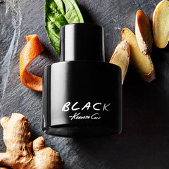 Kenneth Cole Black held in hand to show 0.5 oz travel size and convenient portability