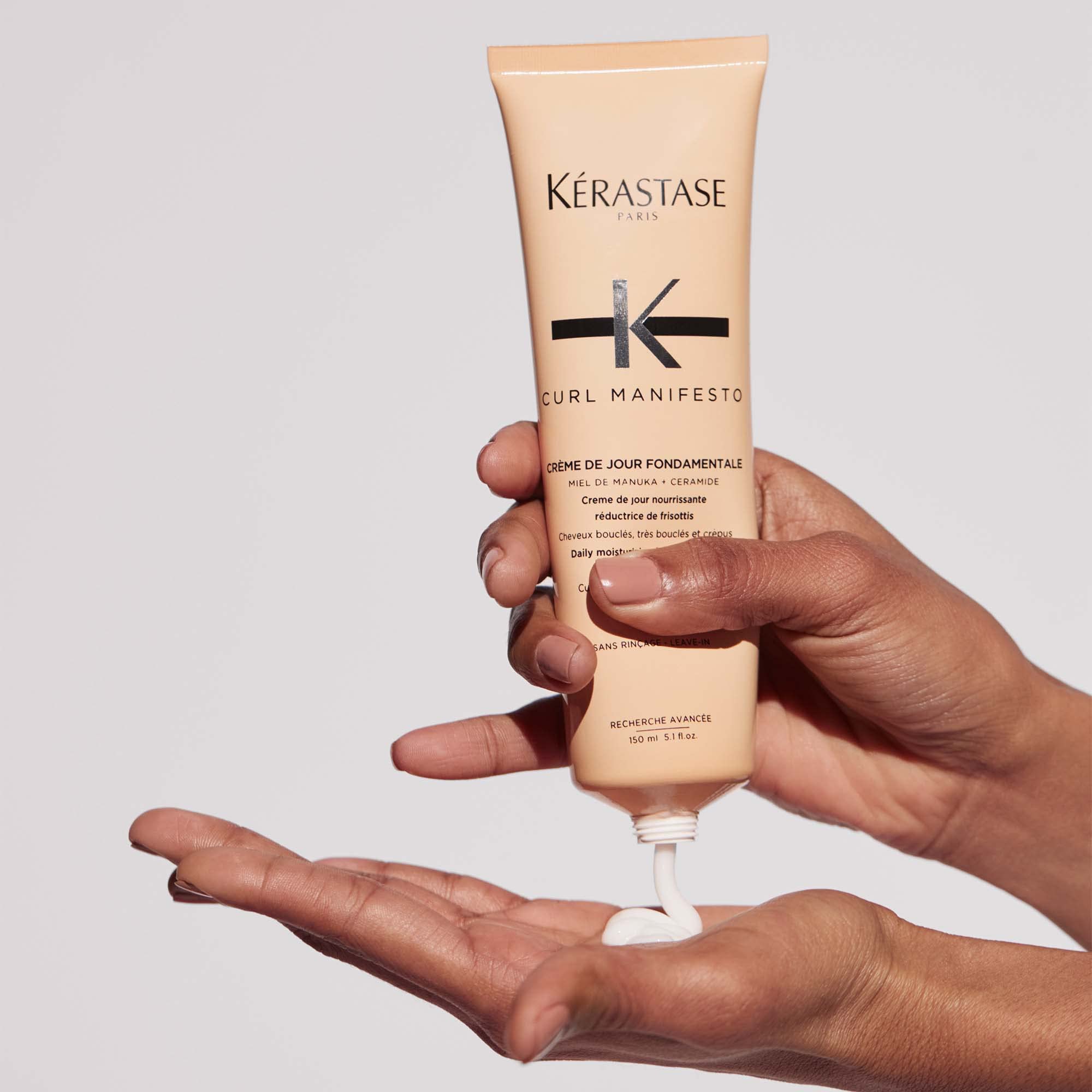 KÉRASTASE before and after curls showing reduced frizz and improved shine