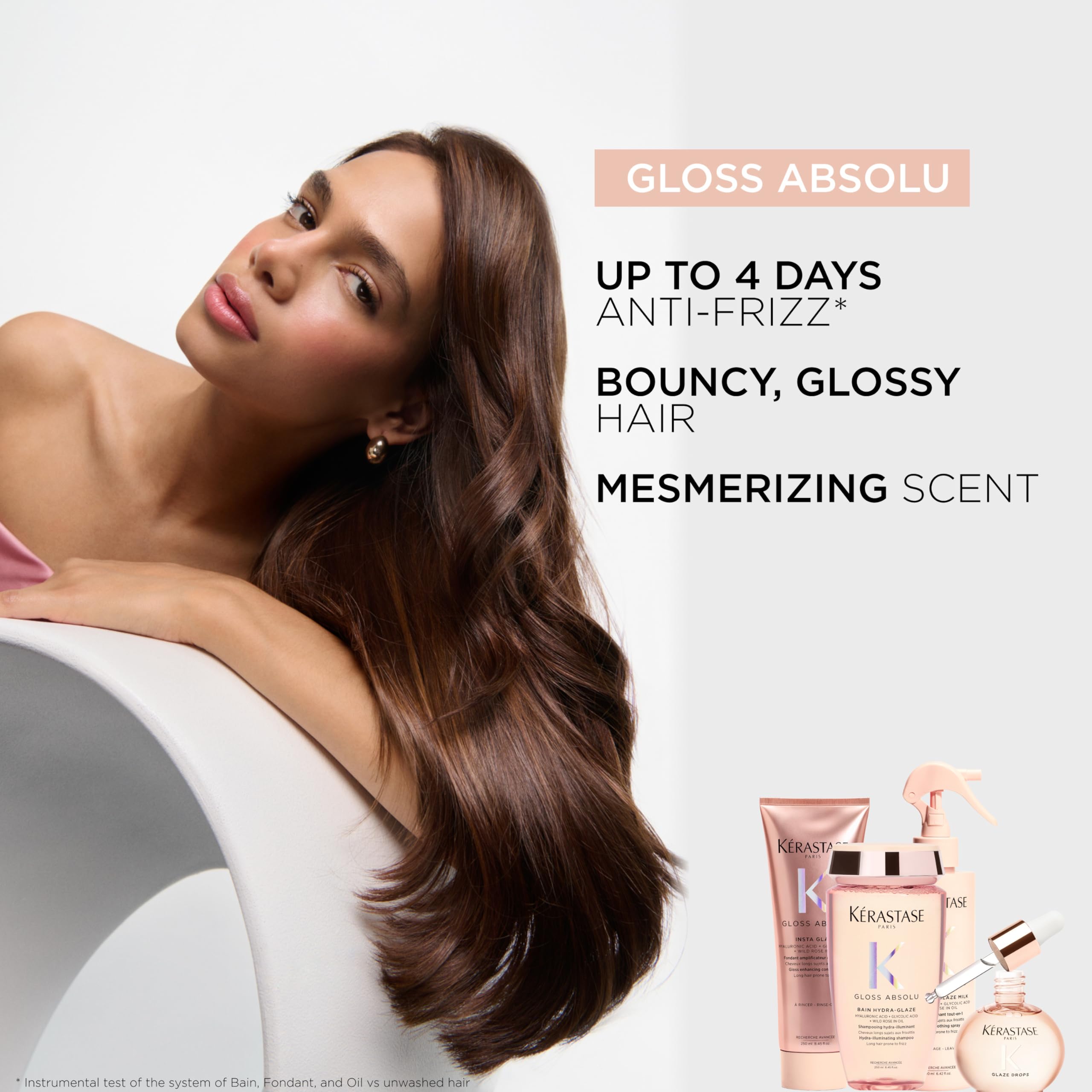 KÉRASTASE conditioner applied on wet hair demonstrating detangling benefit
