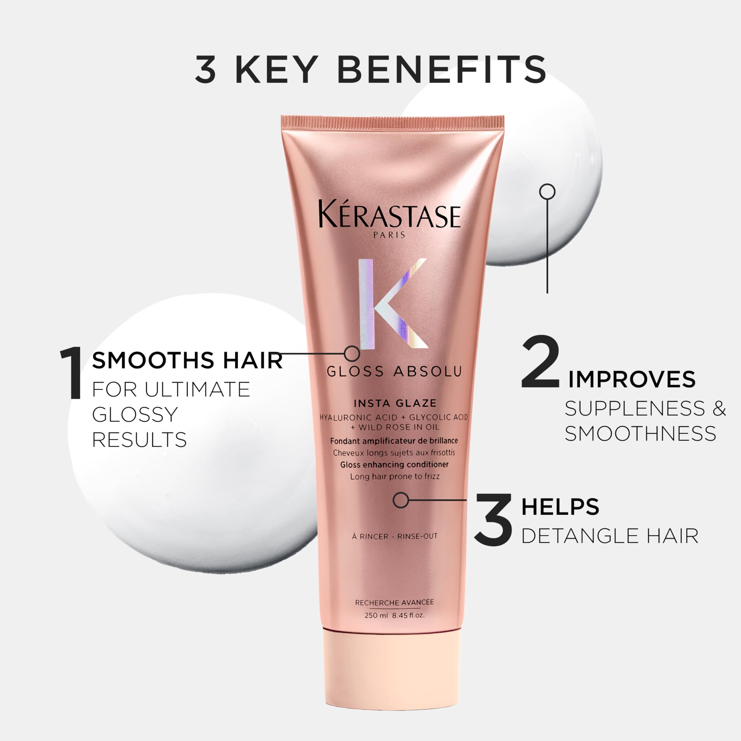 KÉRASTASE conditioner held in hand to show size and easy dispensing