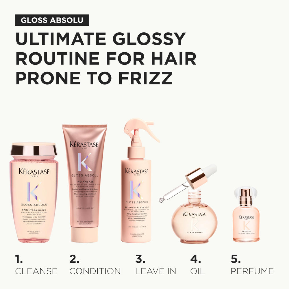 KÉRASTASE flatlay of Gloss Absolu Le Parfum with citrus and floral notes to suggest scent profile