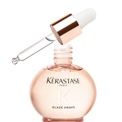 KÉRASTASE bottle front packaging showing premium shine oil benefit