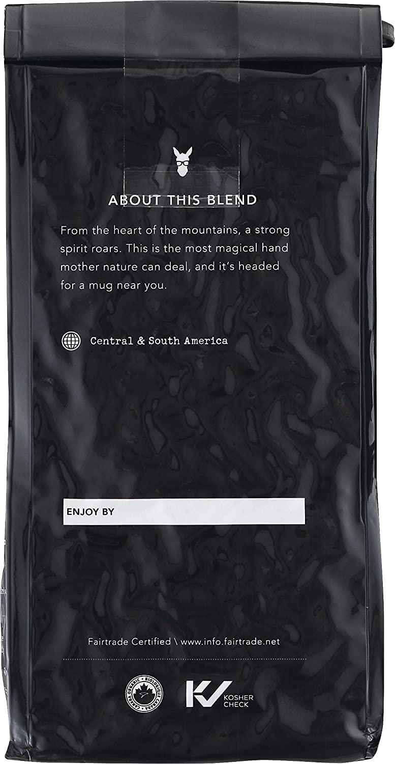 Kicking Horse Grizzly Claw brewed cup in kitchen lifestyle displaying deep color
