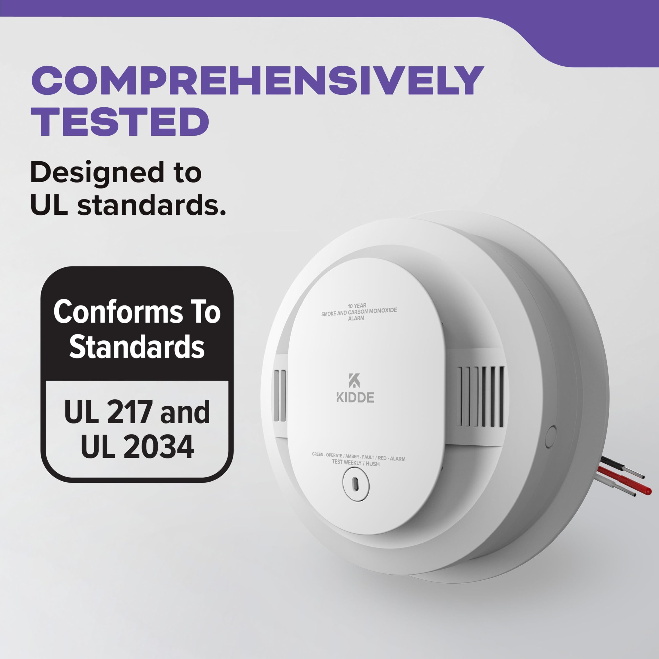Kidde alarm next to a ruler showing compact size for easy placement