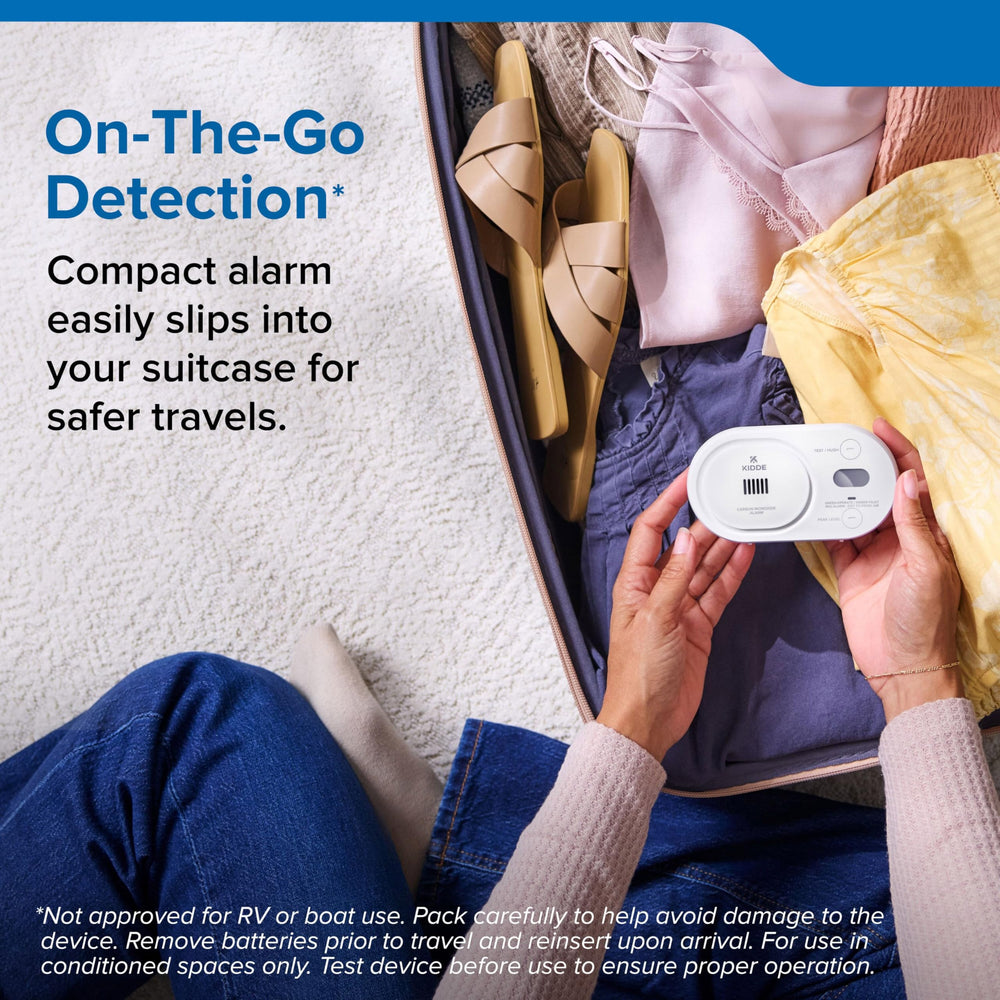 Kidde COBD Test/Hush button detail enabling fast checks and temporary silencing