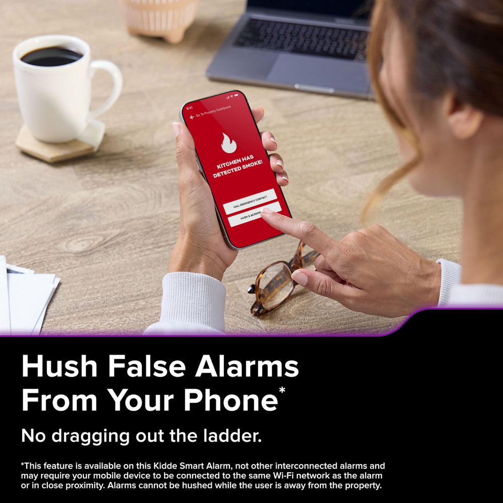 Kidde hush button press demonstrating quieting nuisance alarms quickly