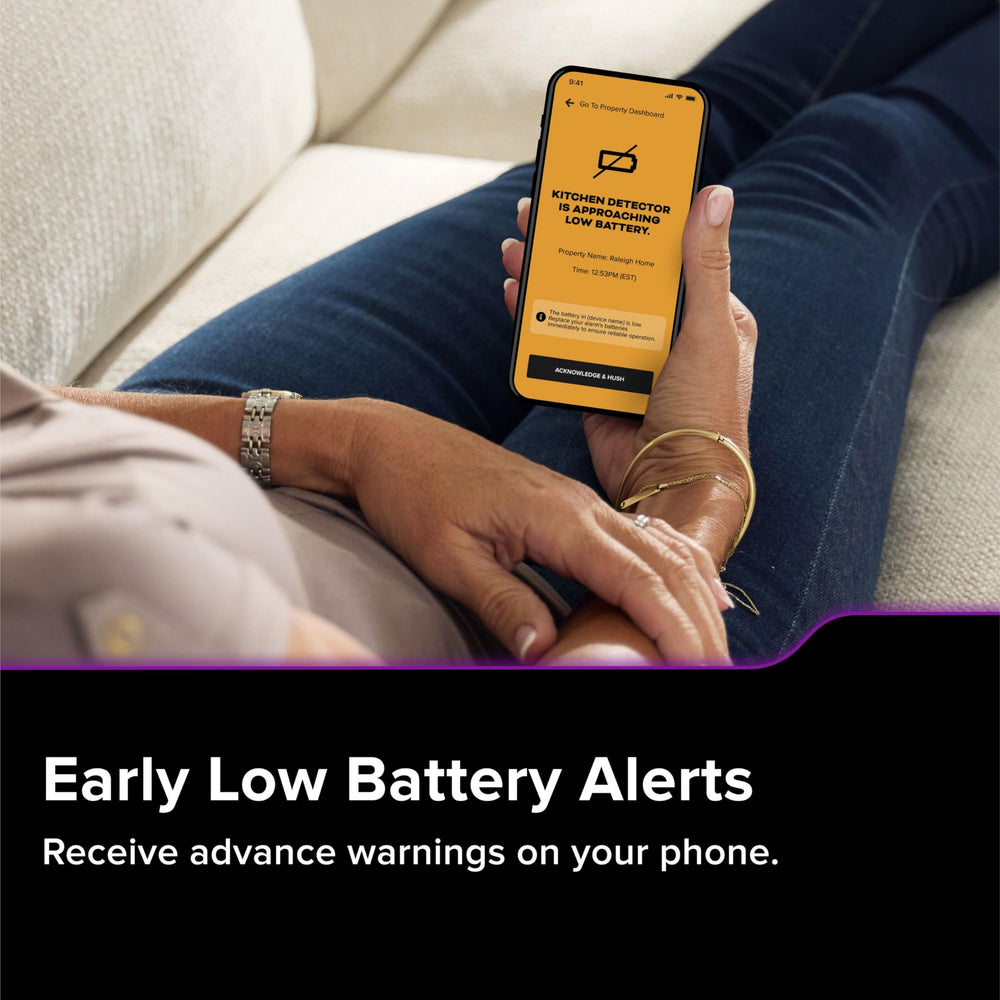 Kidde interconnected alarms across hallway illustrating whole-home notifications
