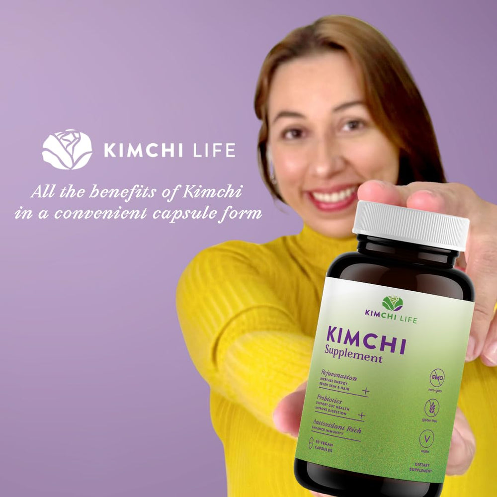 Kimchi Life capsule in hand for size and convenient dosing