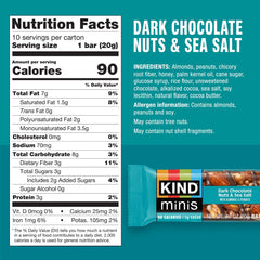 Close-up texture of KIND mini bar highlighting almonds and dark chocolate crunch