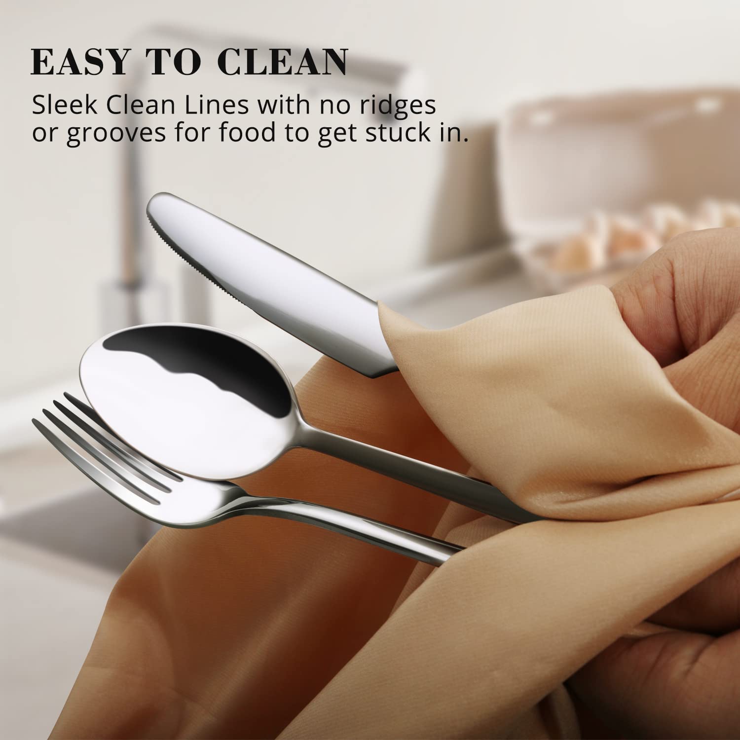 KINGSTONE flatware next to hand for scale showing true size and comfortable grip