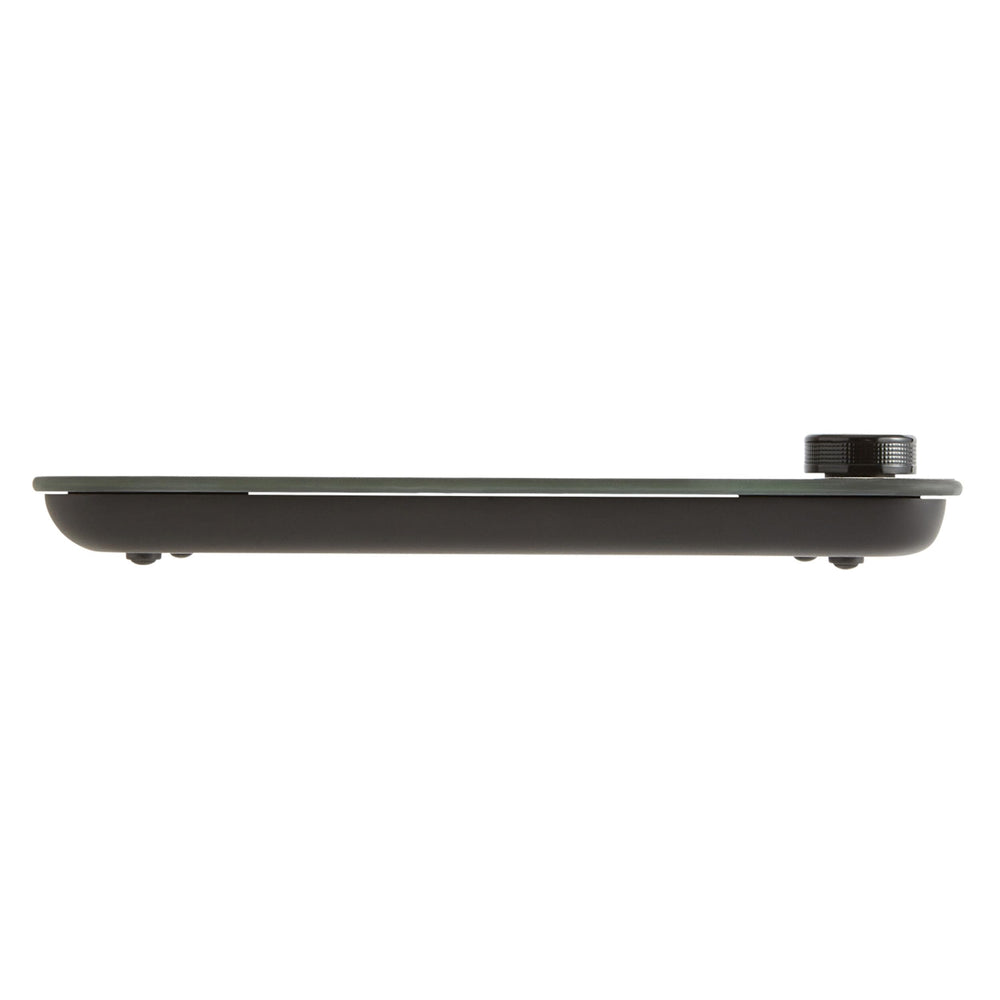 KitchenAid scale with AAA batteries beside fork showing compact size