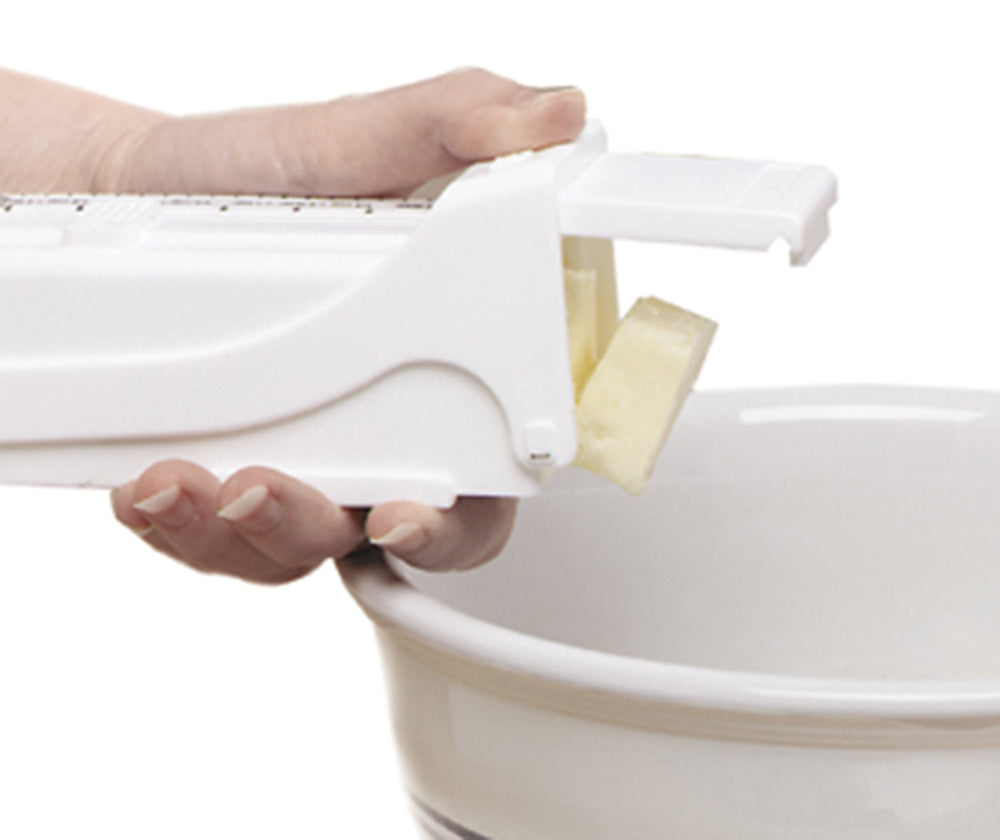 KitchenArt Buttermate one-press touch button dispensing a measured pat