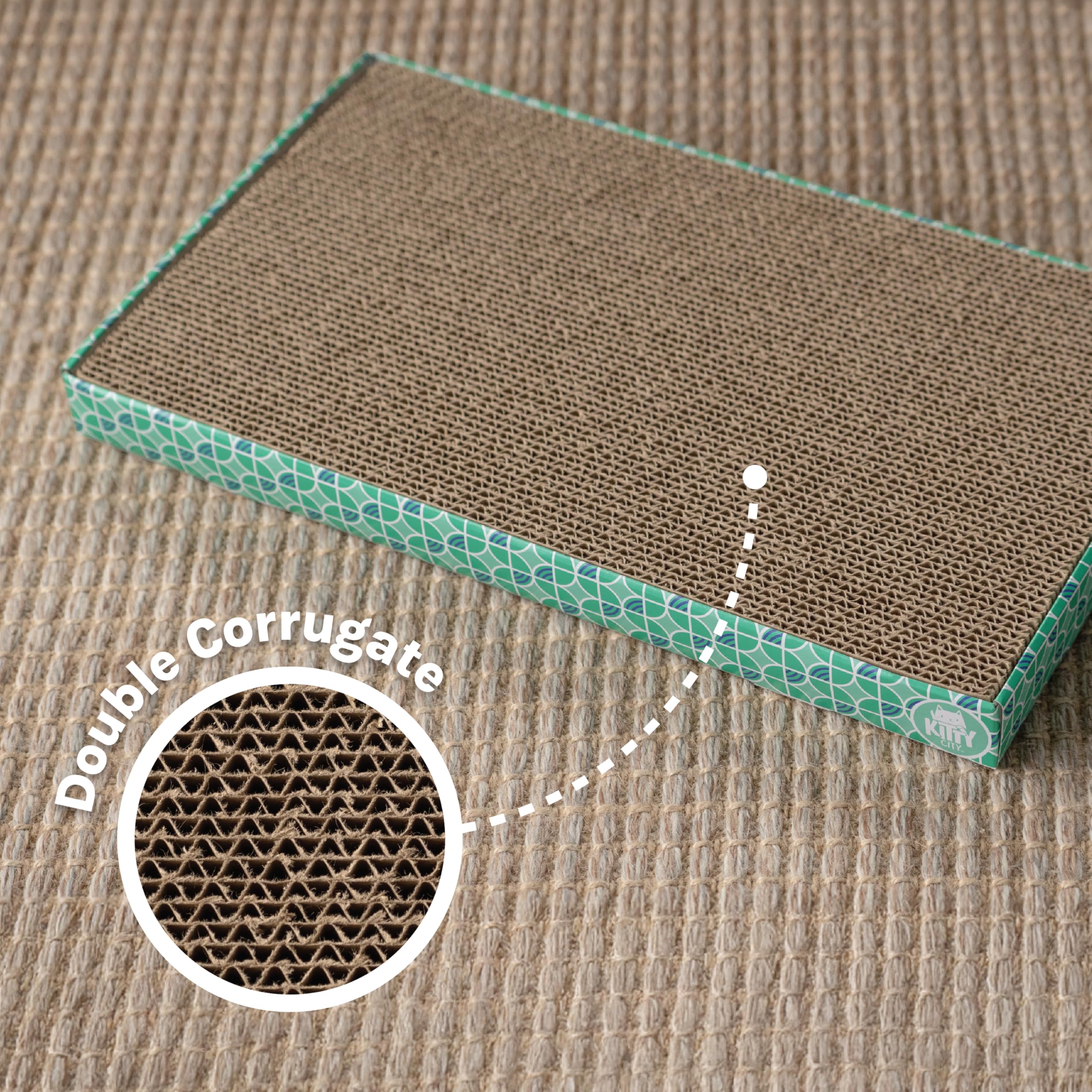 Kitty City cat actively scratching pad demonstrating redirected behavior