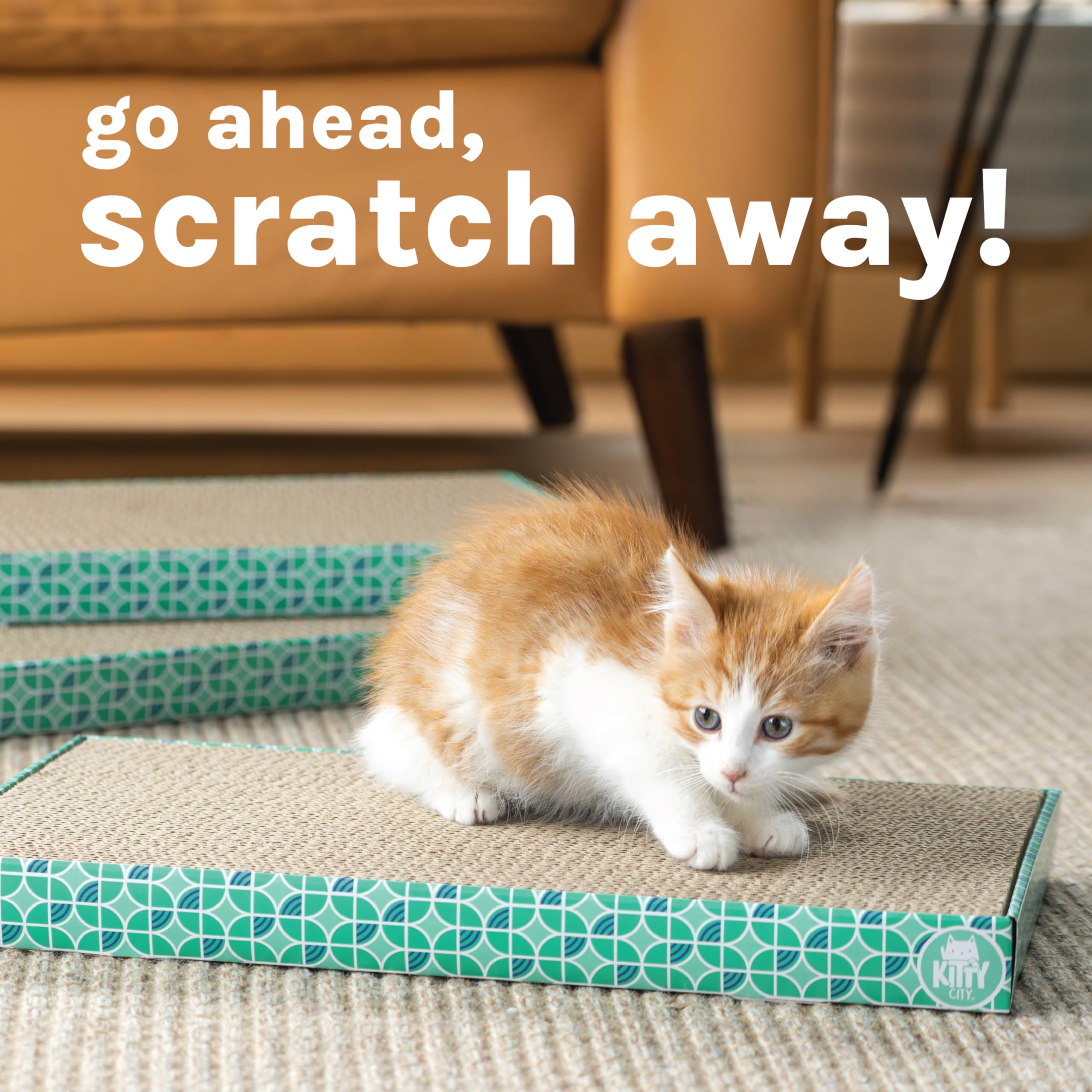 Kitty City pad placed under sofa to shield upholstery and reduce scratches