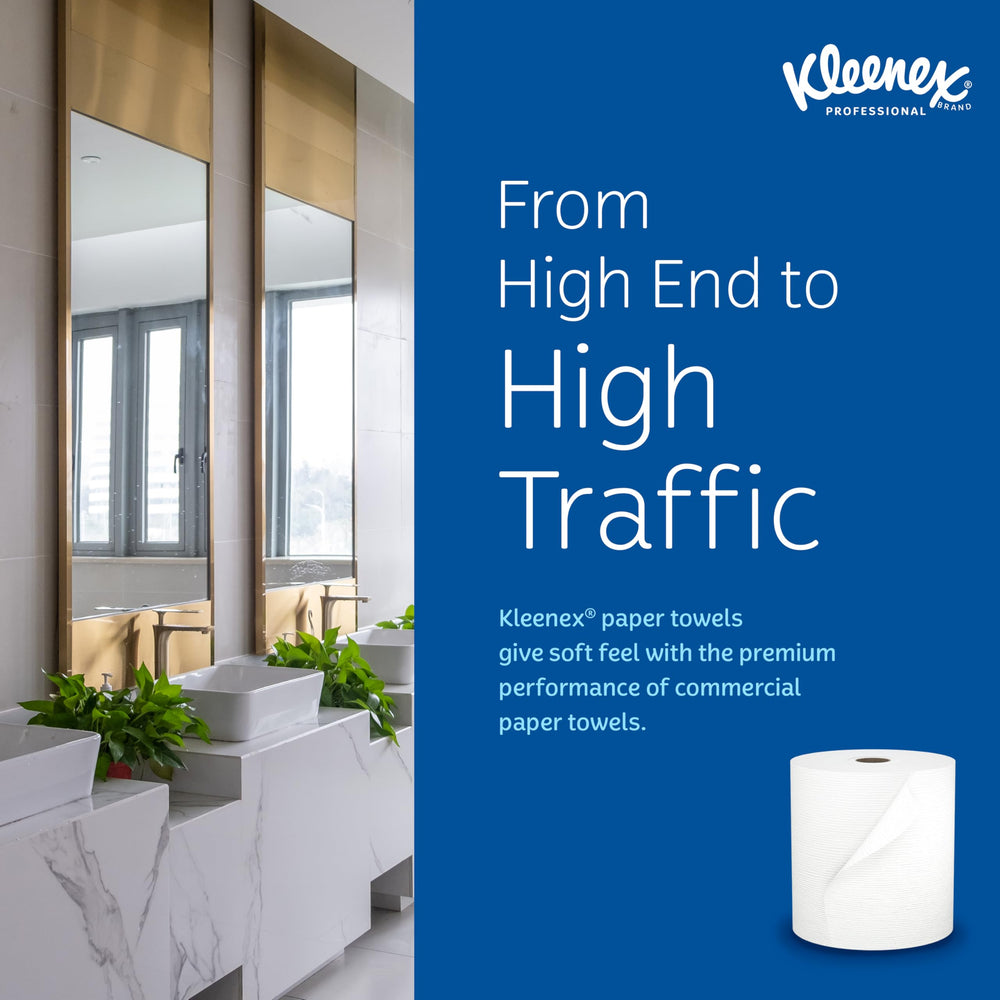 Person drying hands with Kleenex towel, hygienic single-use drying