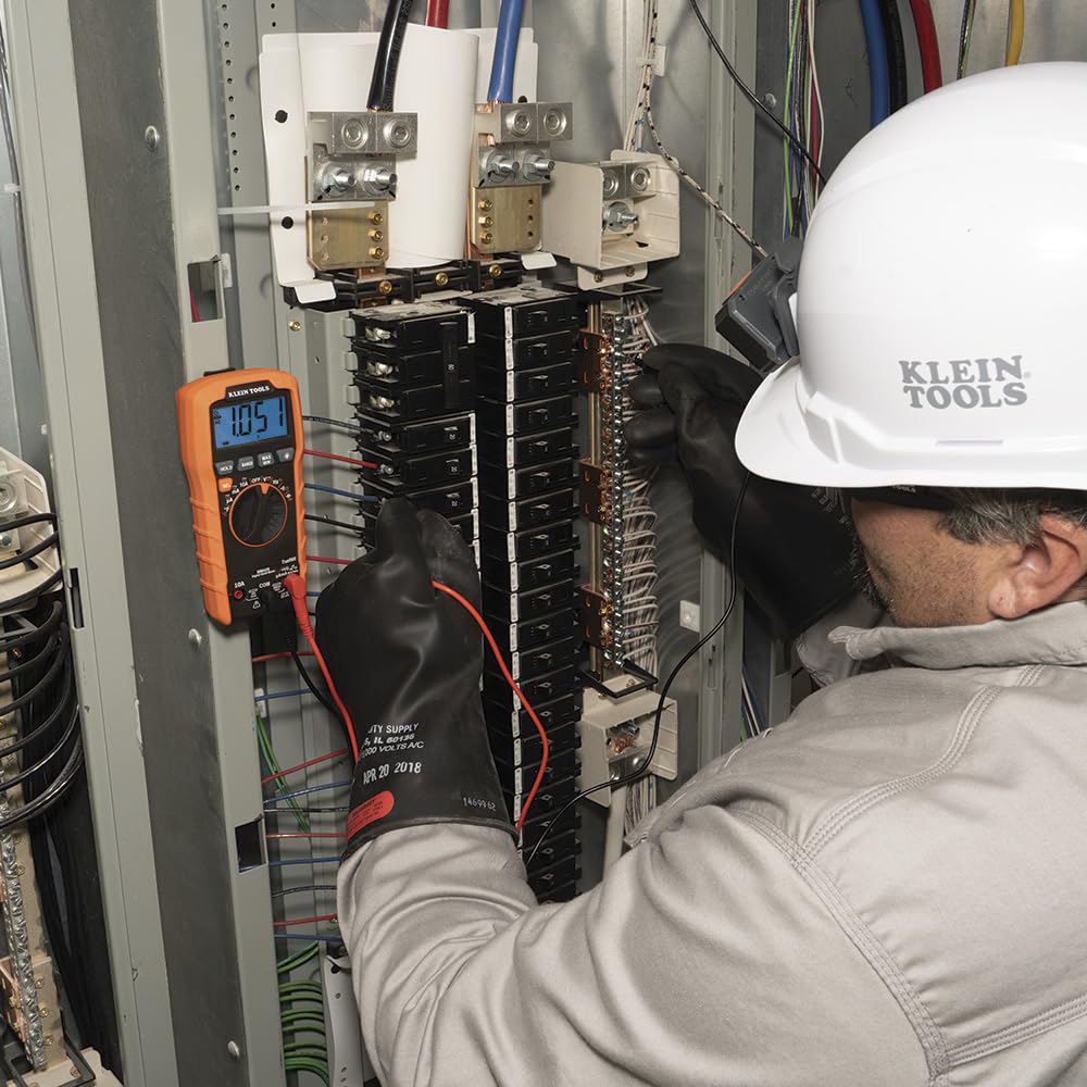 Klein Tools MM420 in hand to show compact size and jobsite portability