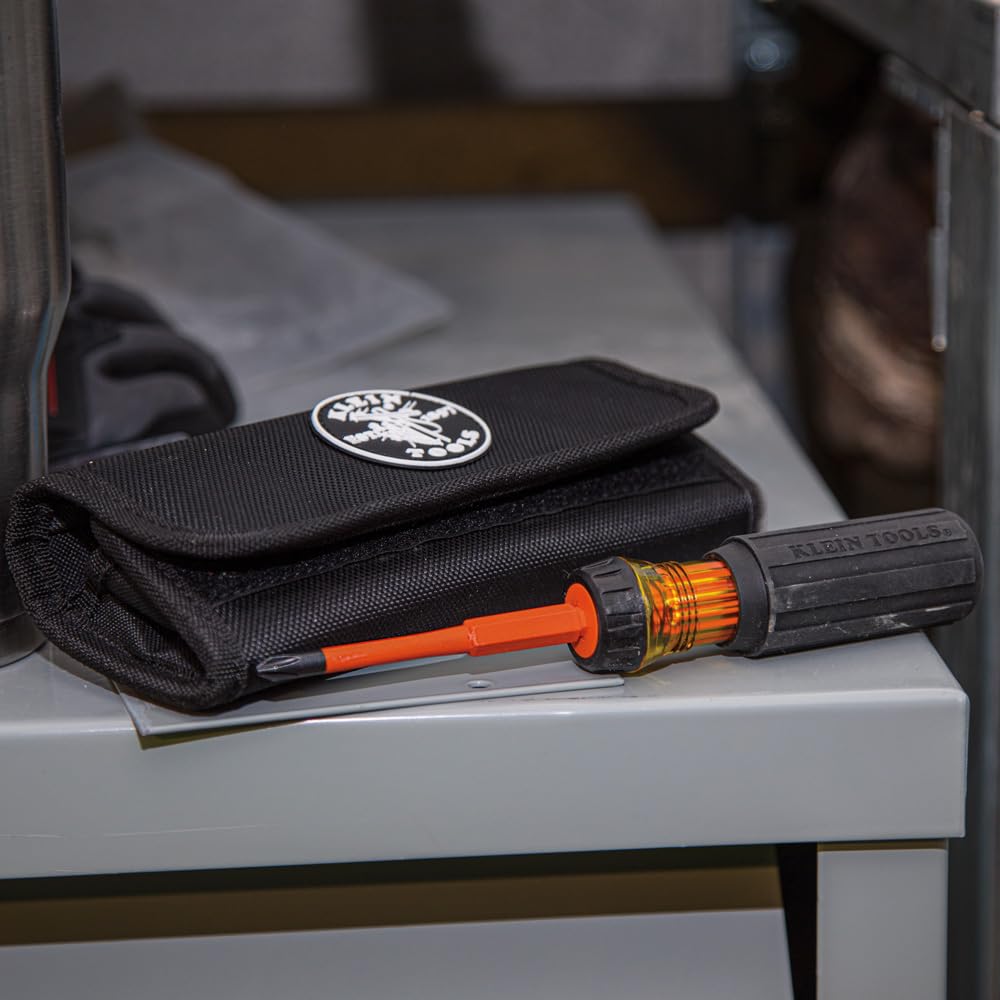 Klein Tools screwdriver in use at a terminal block for safer work