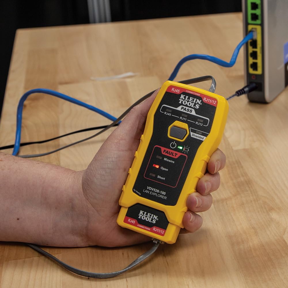 Klein Tools tester connected to patch panel to verify terminations
