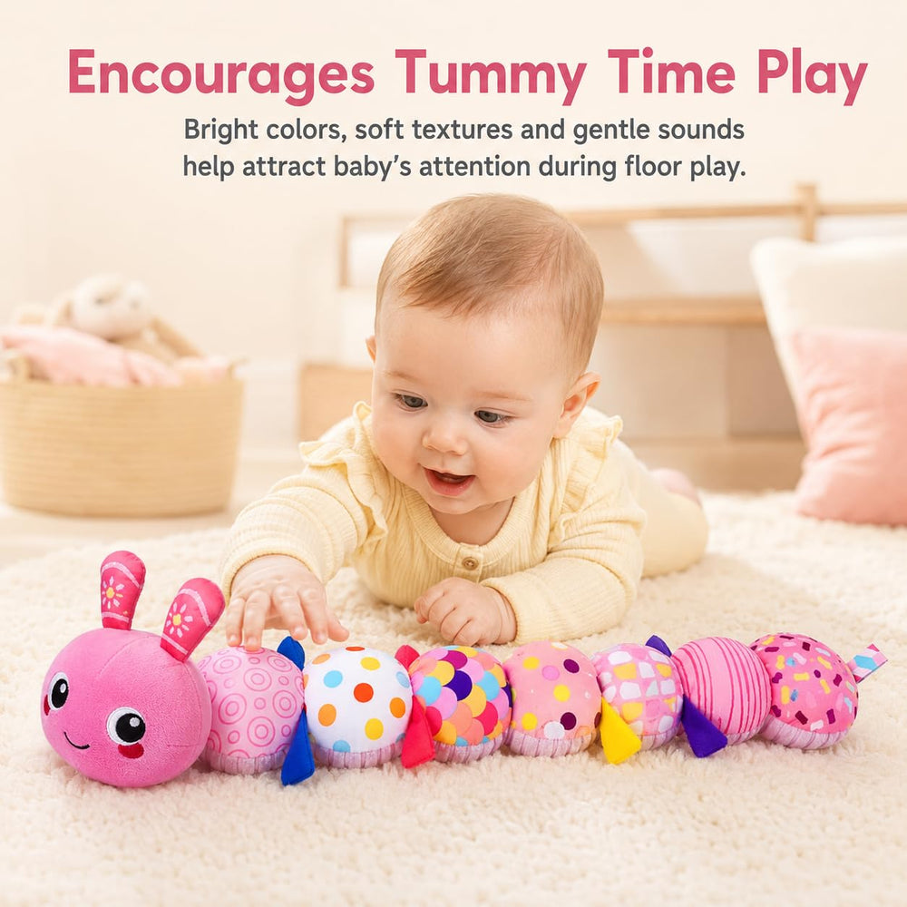KMUYSL music eye detail showing pressable melody feature to soothe and engage
