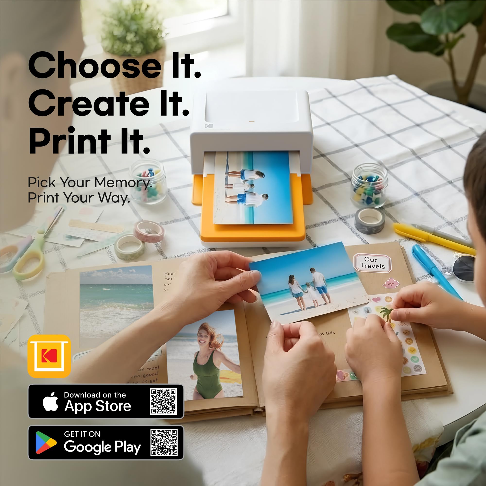KODAK Dock Plus on a family table printing photos for an album