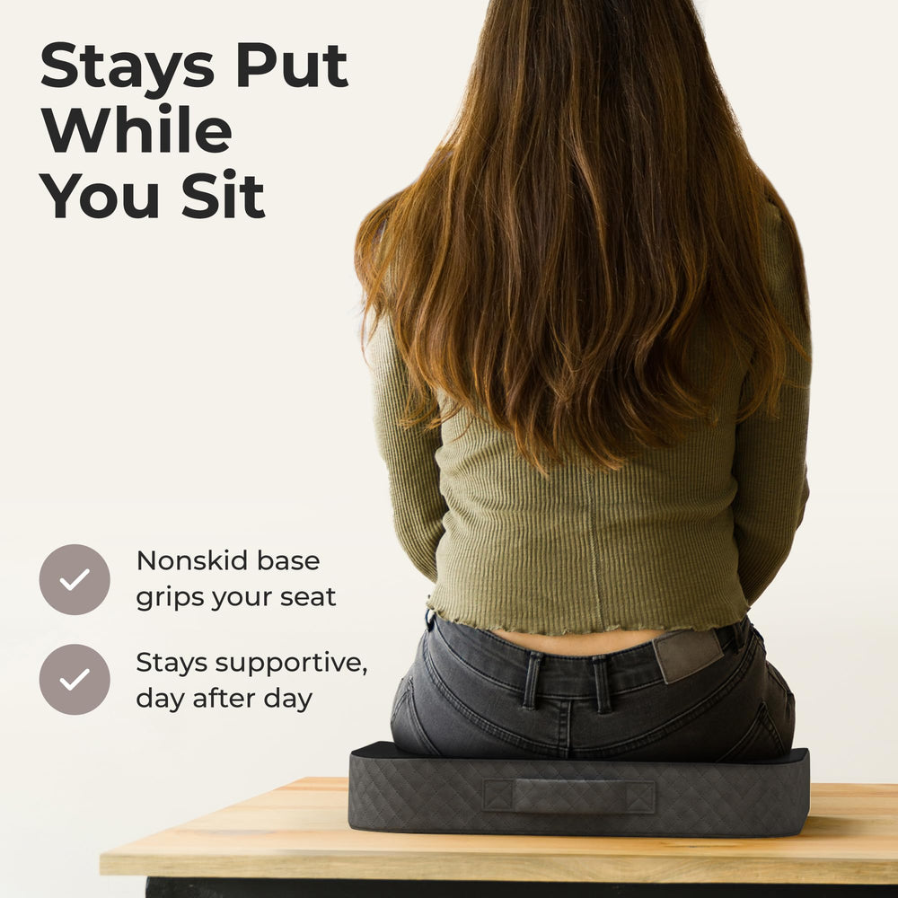 Kölbs on office chair demonstrating support and ergonomic upgrade