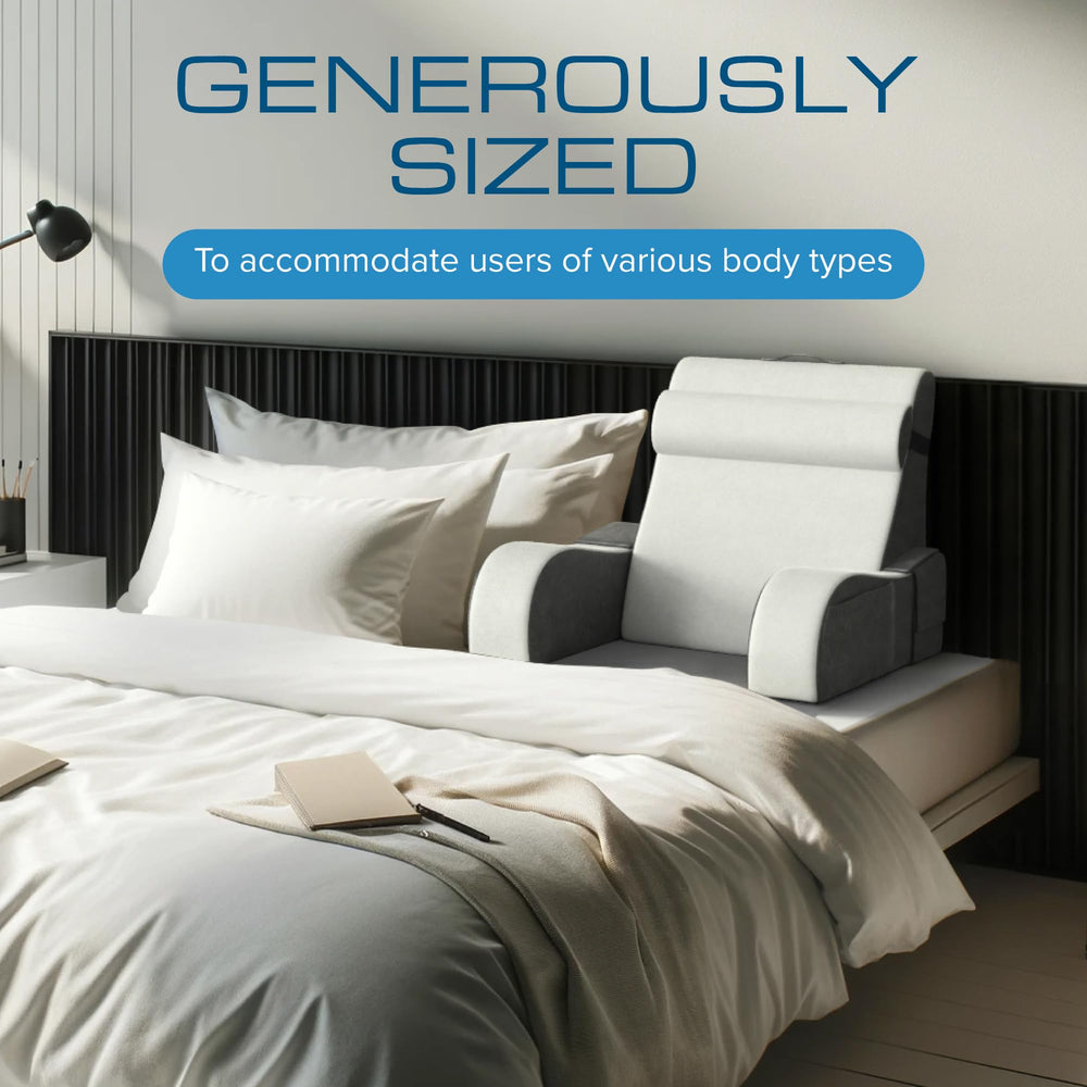 Kölbs pillow beside book and remote to show scale and bedside convenience