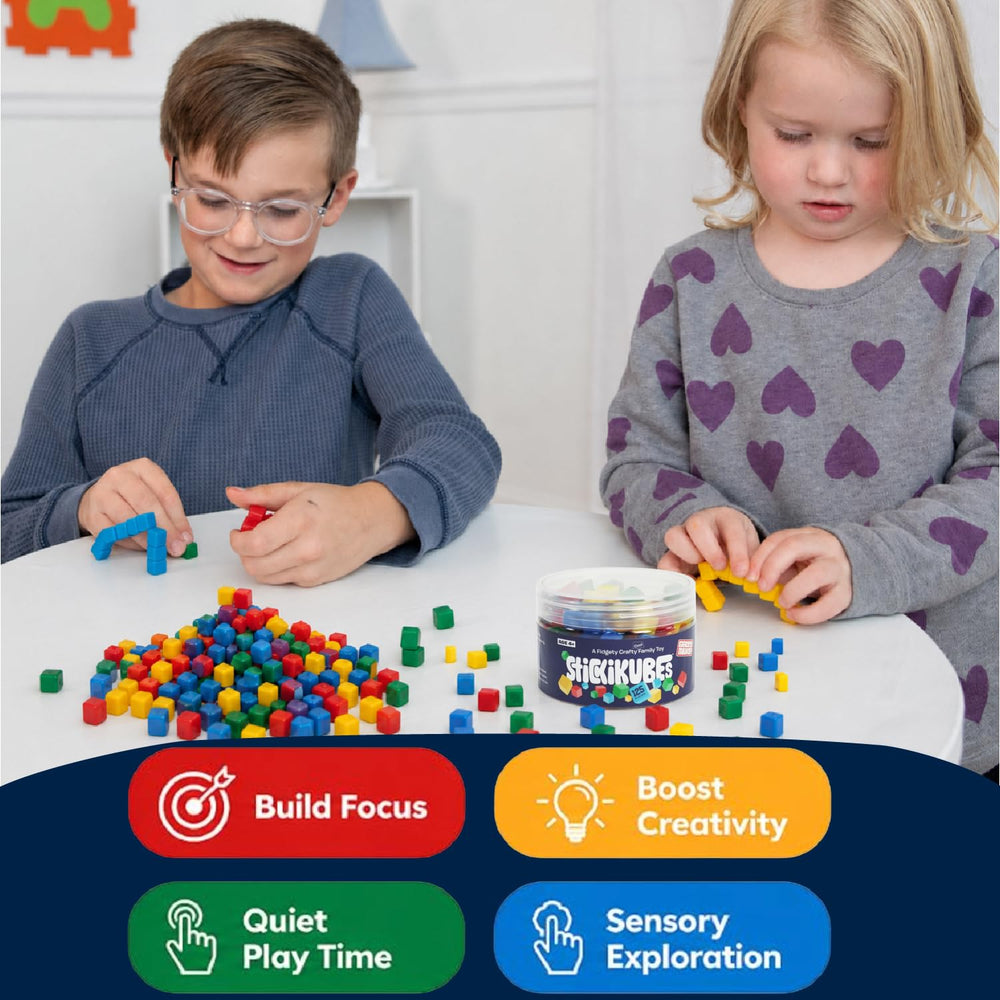 KOMARC GAMES cubes used in a classroom activity promoting STEM learning and cooperative building