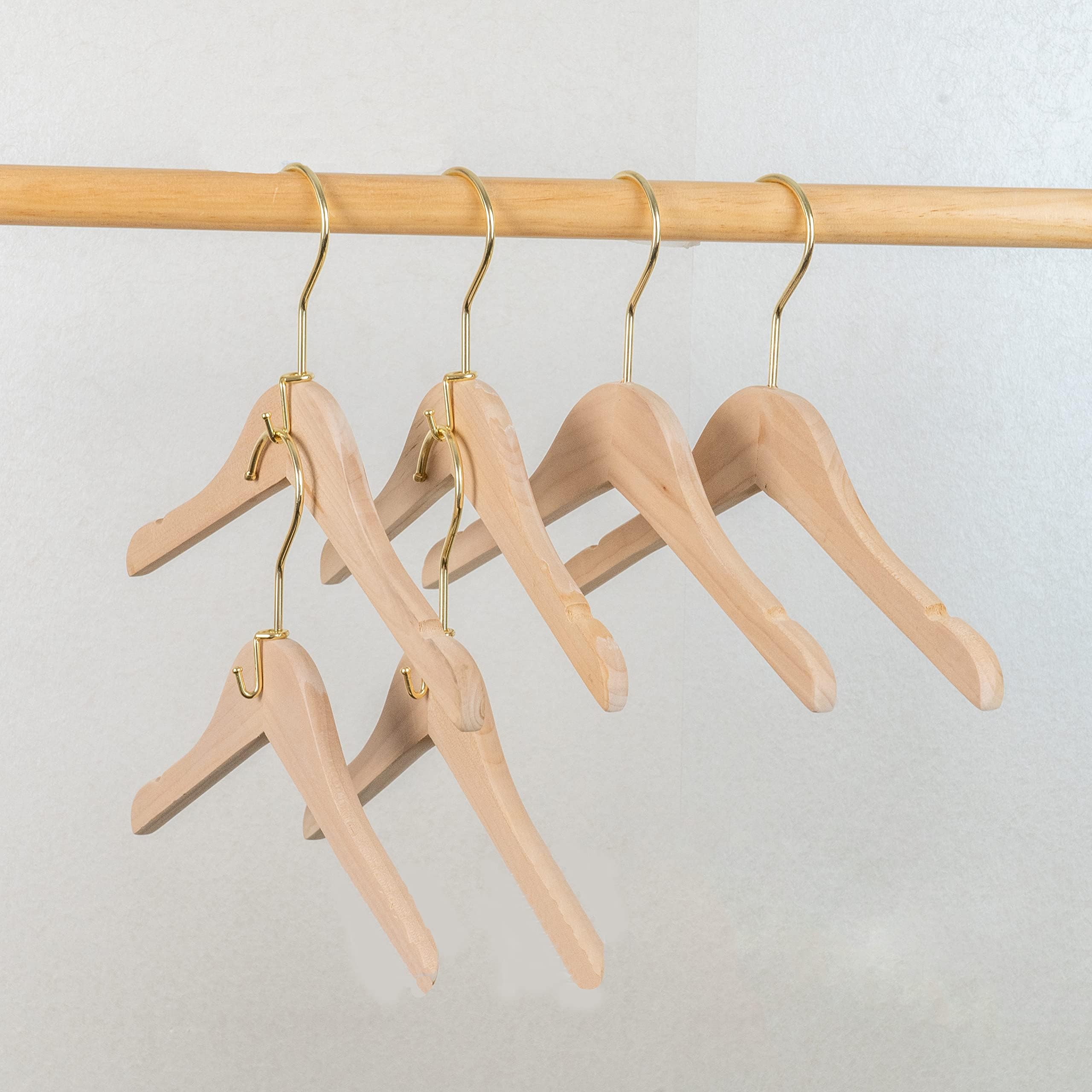 Koobay hooks supporting jeans and coats demonstrating strong hold benefit