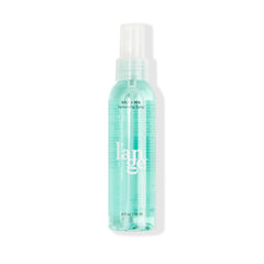 L'ANGE HAIR front bottle shot showing sleek packaging and travel-friendly size