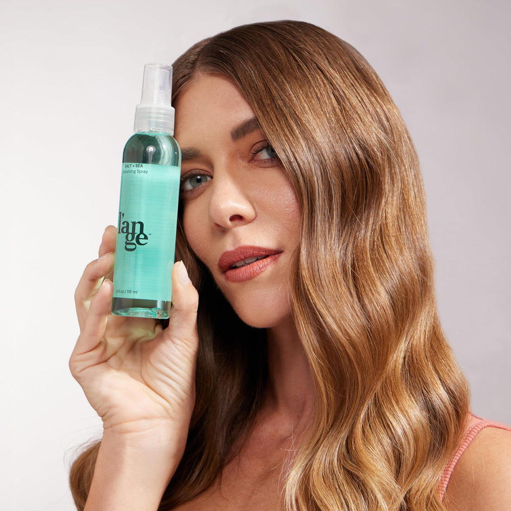 L'ANGE HAIR label close-up highlighting sea salt and kelp ingredients benefit