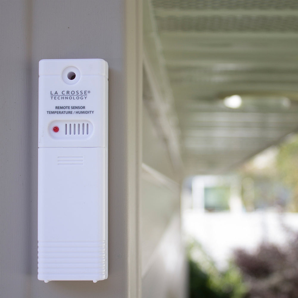 La Crosse TX141TH-BV4 in backyard setting providing outdoor monitoring benefit