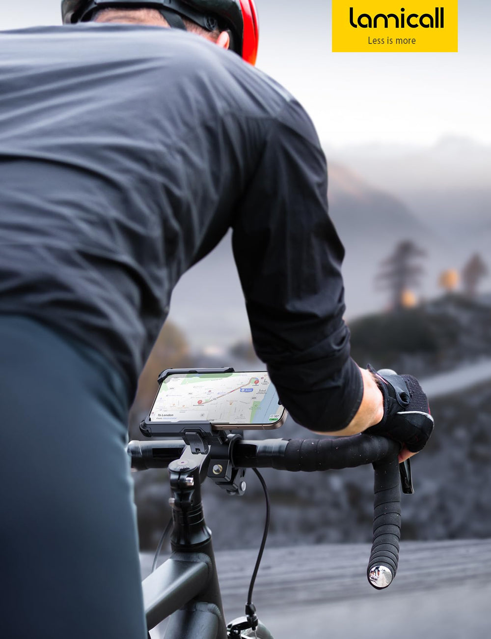 Lamicall next to ruler showing fit range for handlebars and phone sizes
