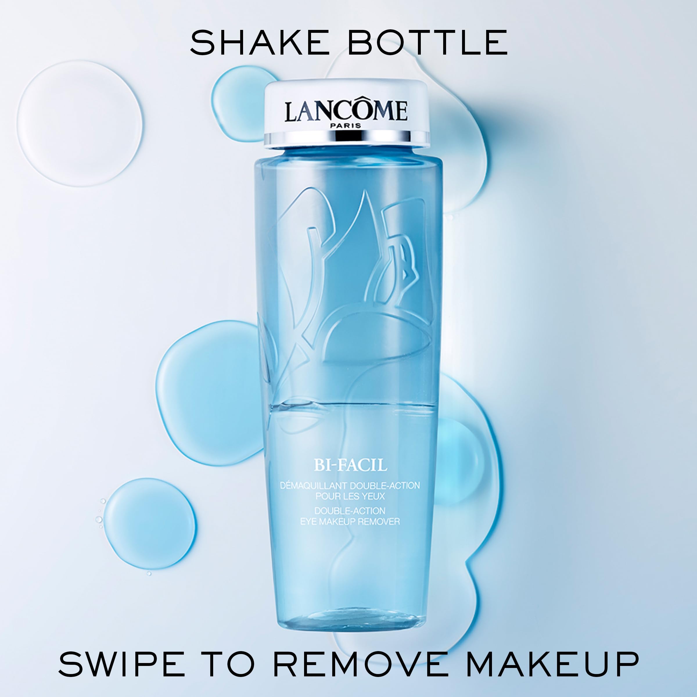 Lancôme Bi-Facil next to ruler showing 6.7 fl oz size for scale
