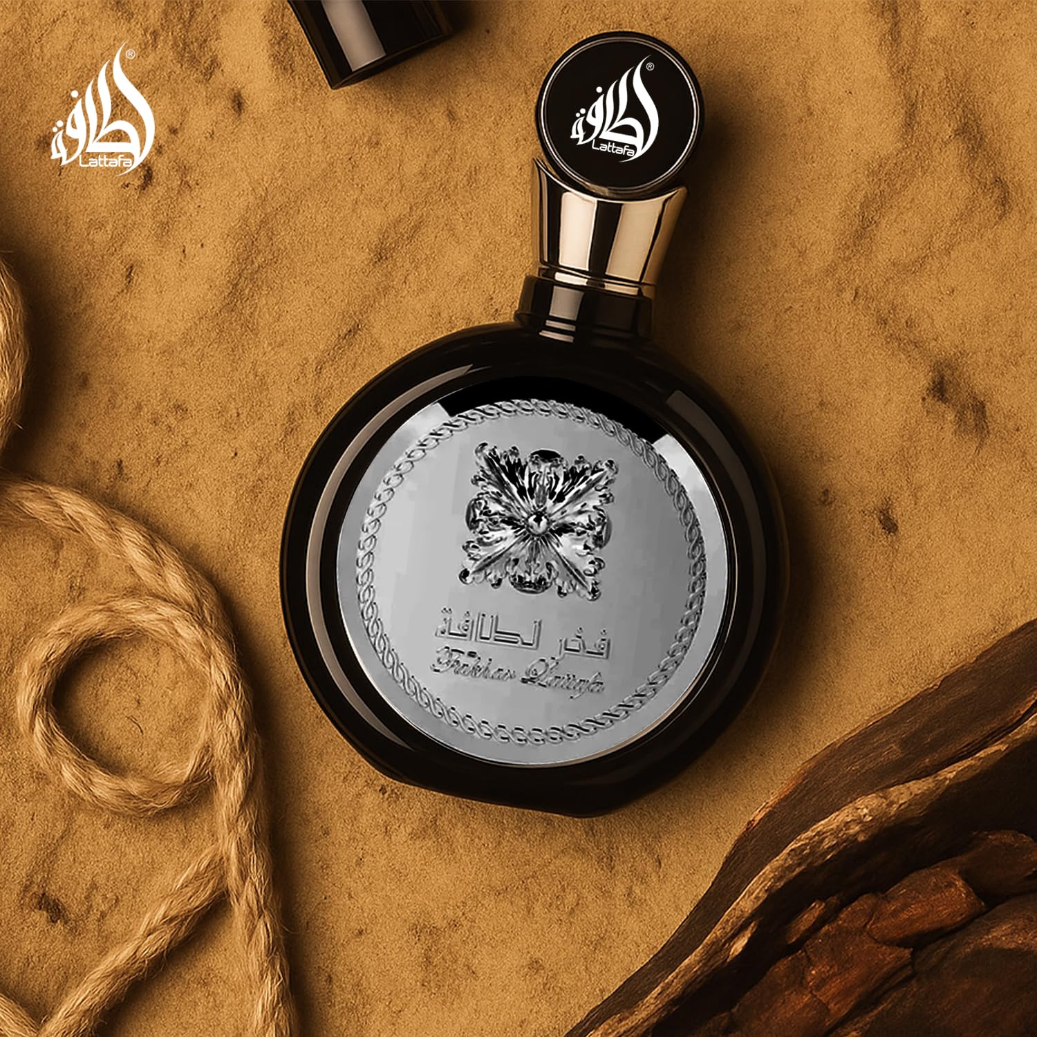 Droplet of Lattafa Fakhar on skin revealing smooth texture and subtle creaminess