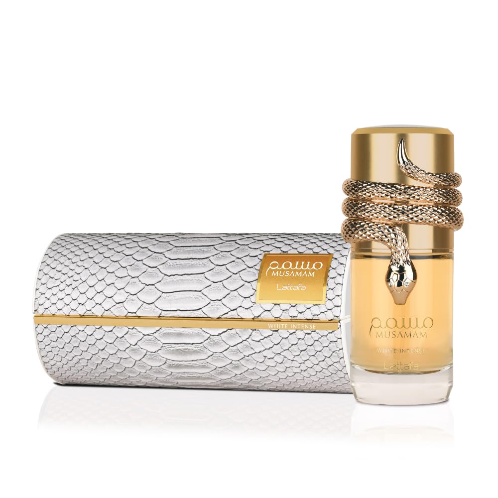 Lattafa Musamam White Intense spray in use demonstrating fine mist and wearability